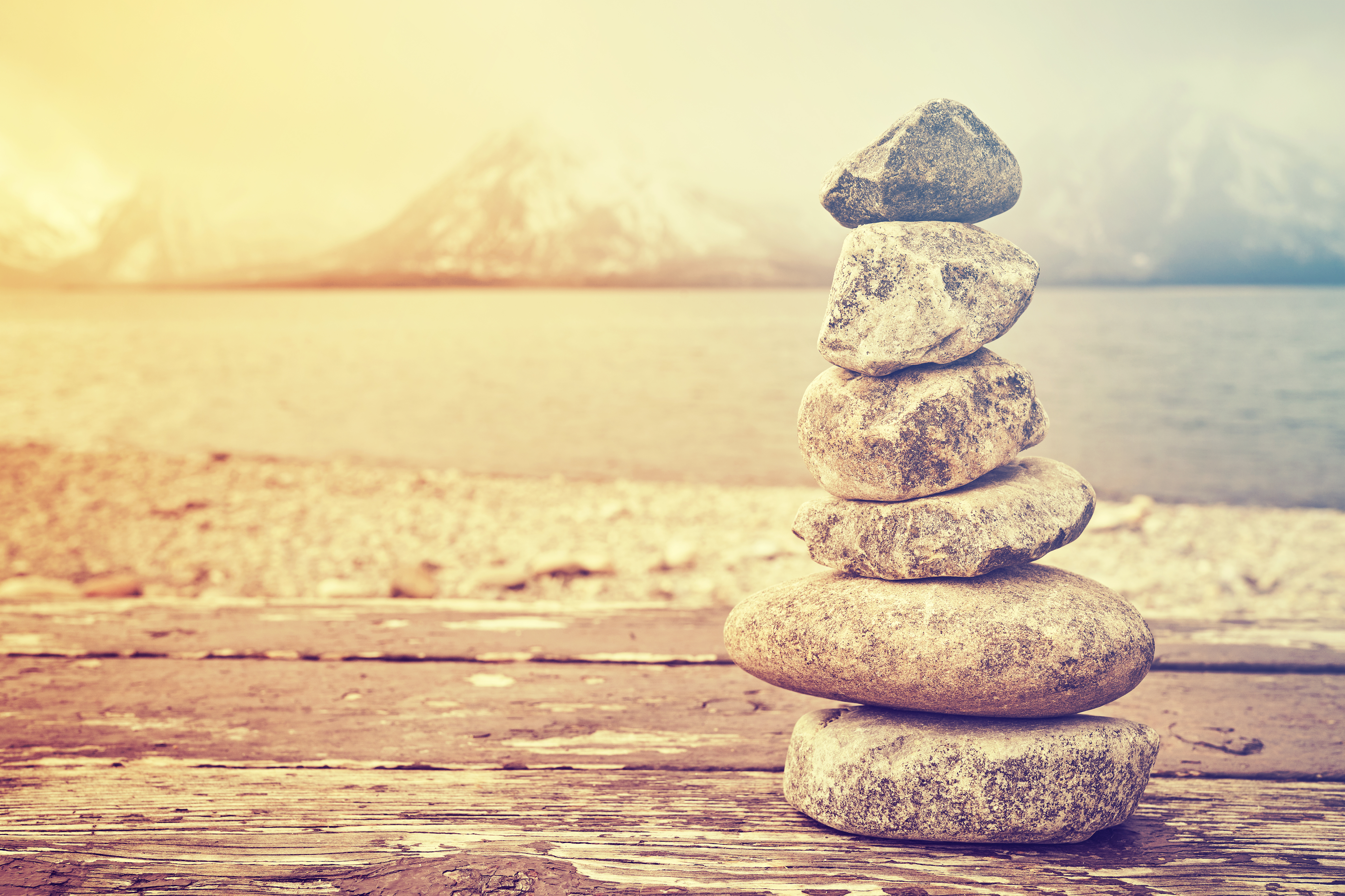 Vintage toned stack of stones, balance and harmony concept, Grand Teton National Park, Wyoming, USA.